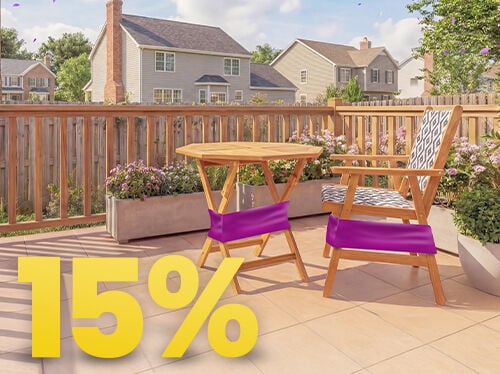 Outdoor wooden patio table and chair with purple sale bands displayed on a sunny terrace, featuring a prominent 15% discount message. Click to see the products in the collection.