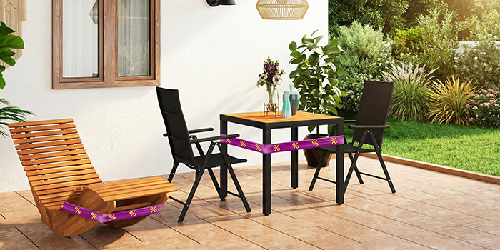 Outdoor patio setup with a wooden table, black chairs, and a wooden armchair placed on a tiled terrace. Click to see the products in the collection.