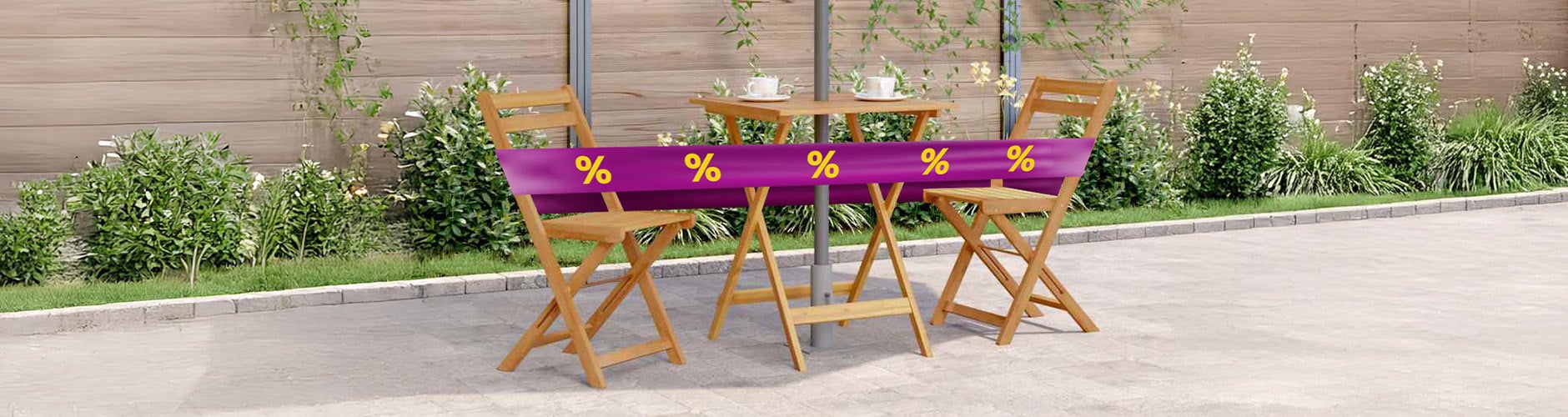 Black chairs and white table wrapped in purple band displaying yellow discount icons in a patio setting.